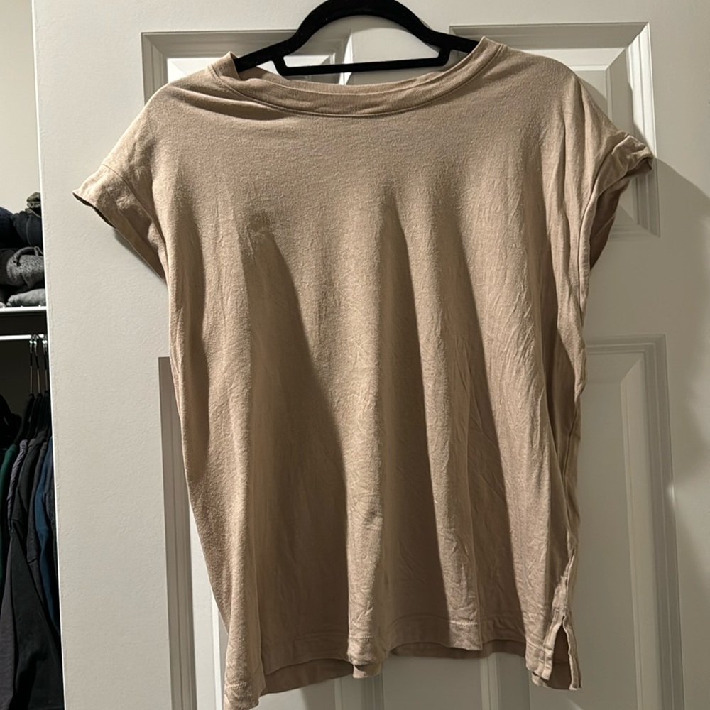 A new day tan shirt
